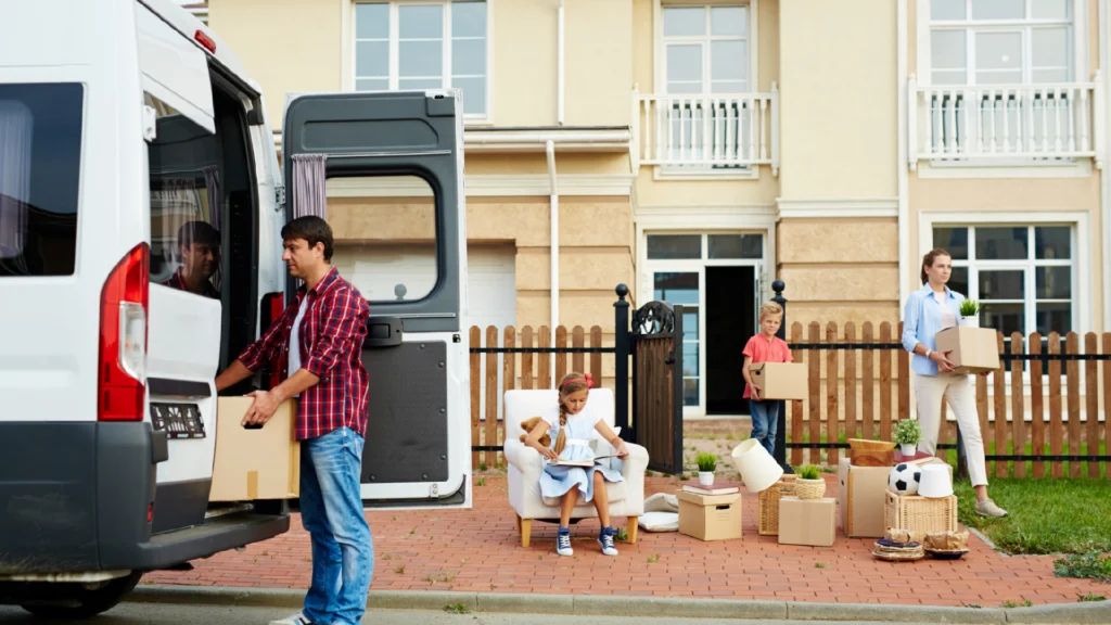 Family loading boxes into a moving van in Bellingham, MA